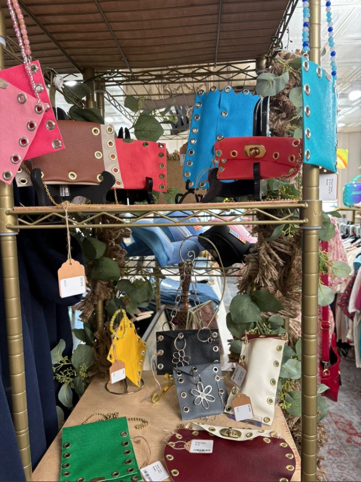 Handcrafted studded leather purses in bright colors